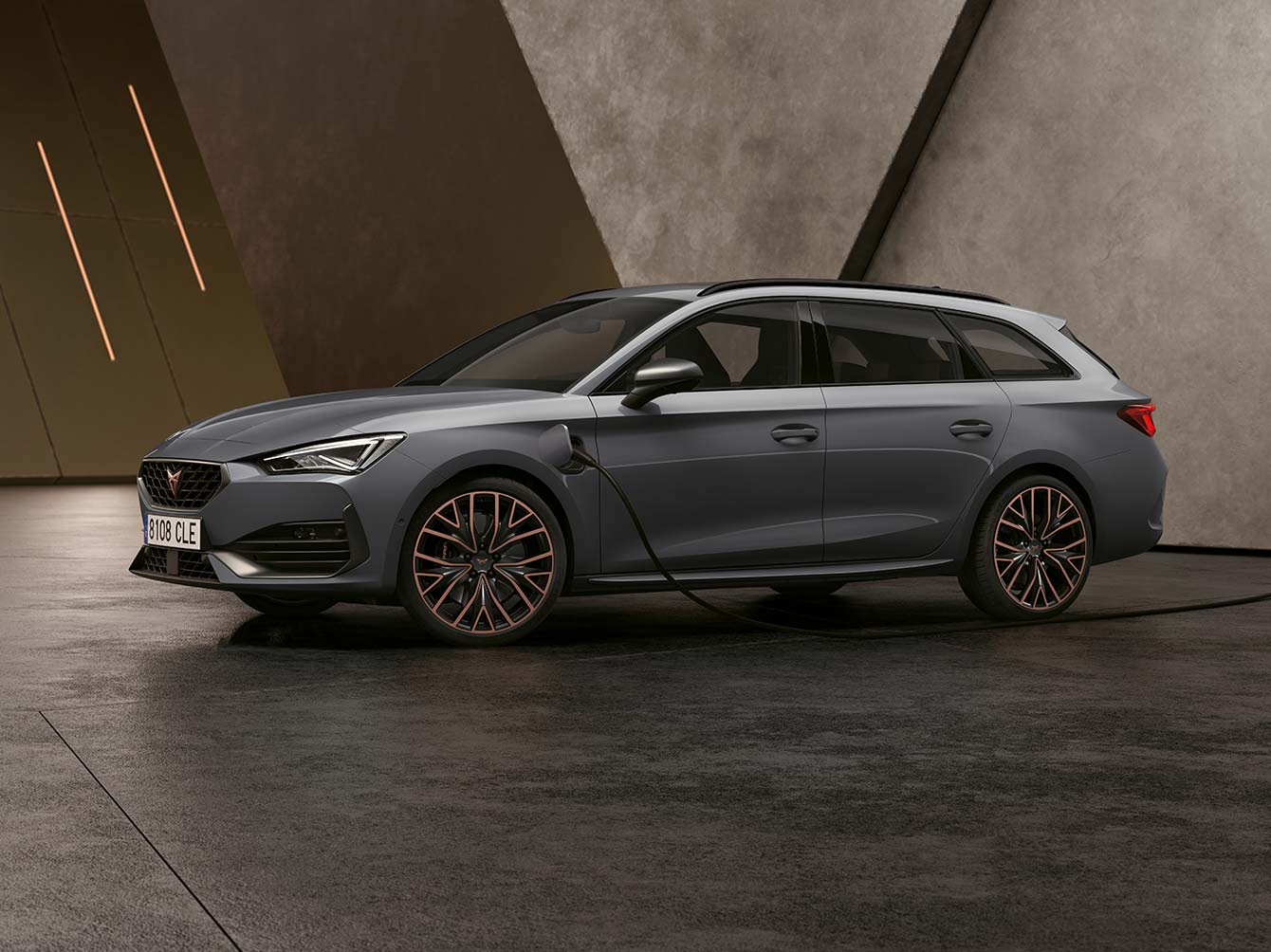 new CUPRA Leon Sportstourer ehybrid Family Sports Car in graphene grey charging