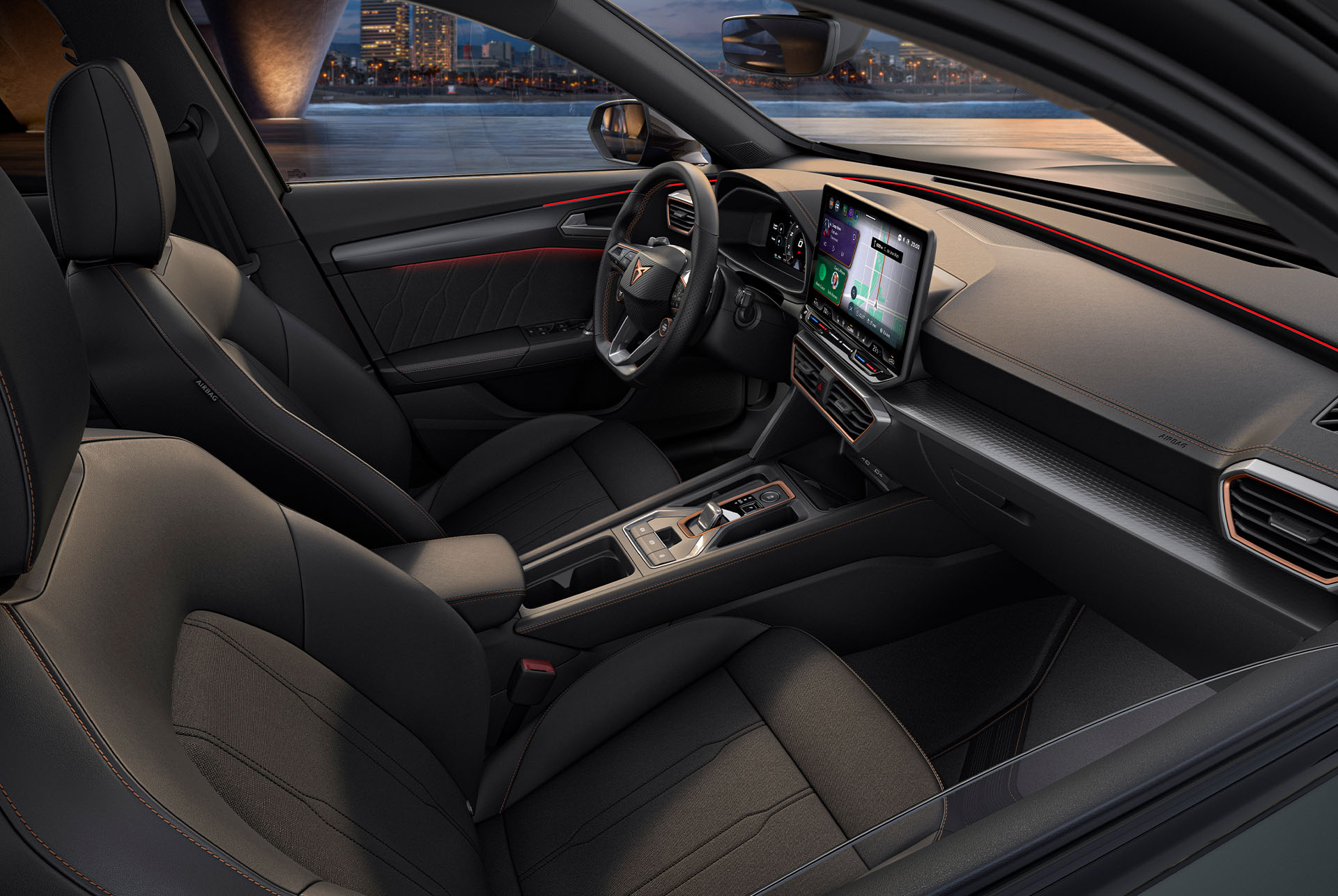 Angle, side shot of the driver and passenger seats of the CUPRA Formentor, showcasing a sharp, yet minimal finish.