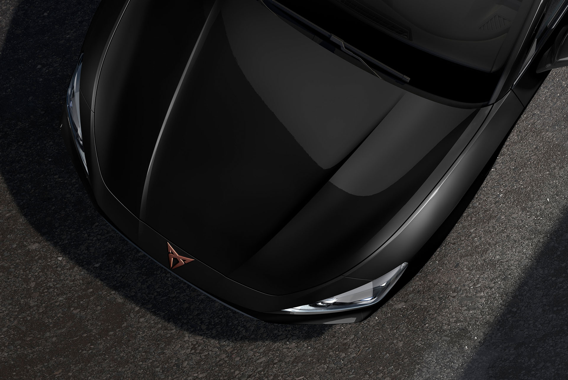 bird’s eye view of a midnight black cupra leon sportstourer 2025 car hood