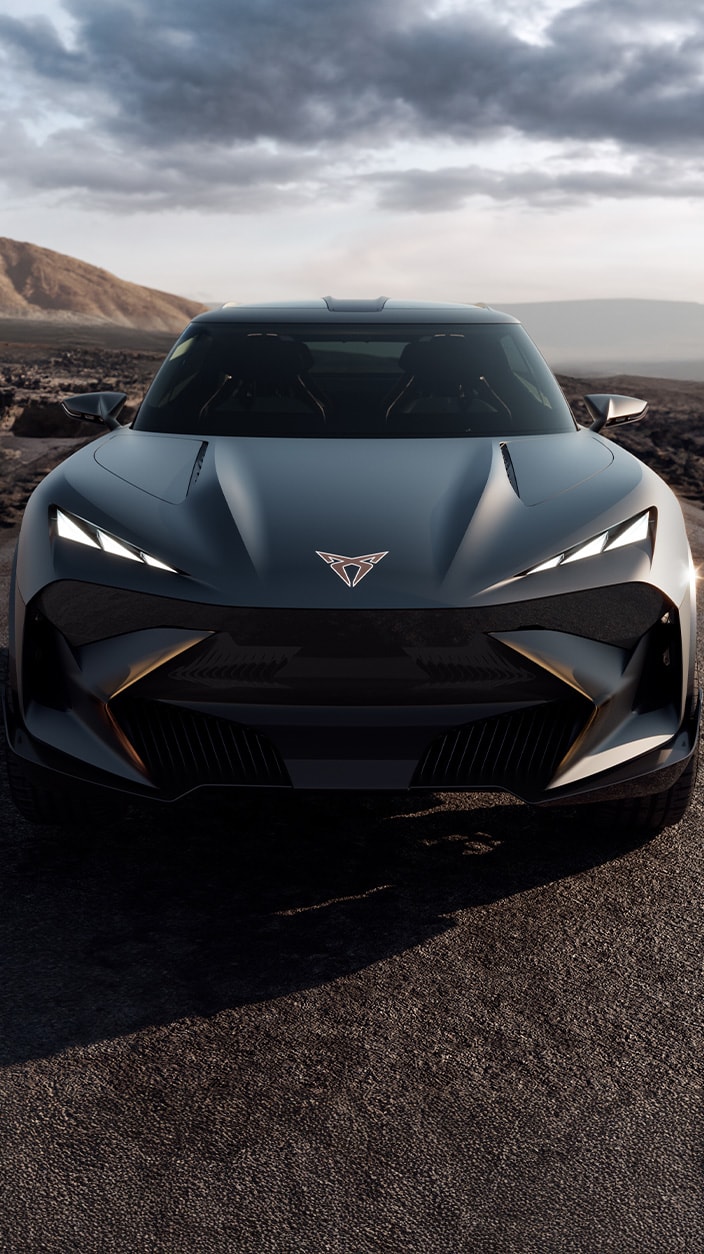 CUPRA Tindaya, a  futuristic car with aggressive design and the distinctive Cupra logo on the hood are key identifiers.